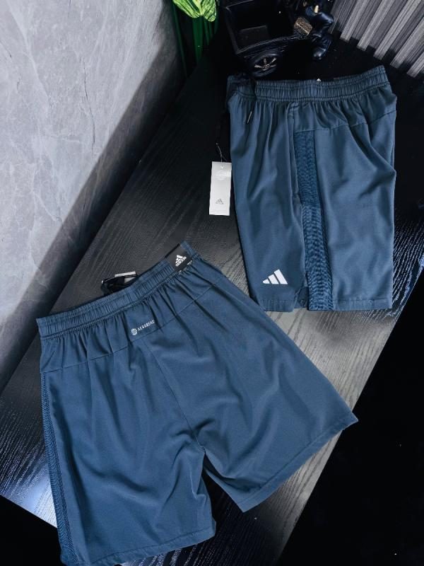 PANTALONETA 1.1 ADIDAS GRIS